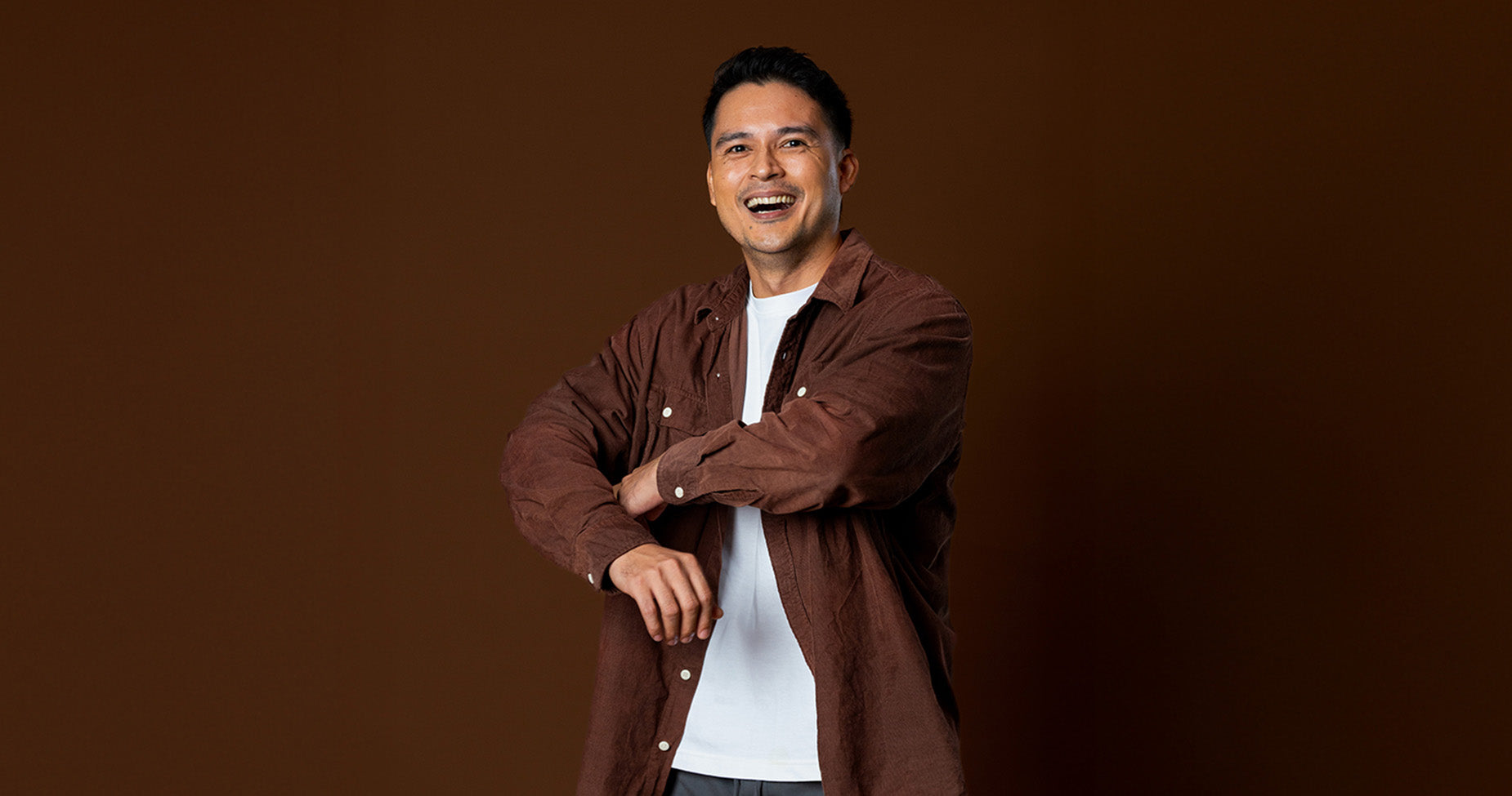 Man holding AndYou product bottle