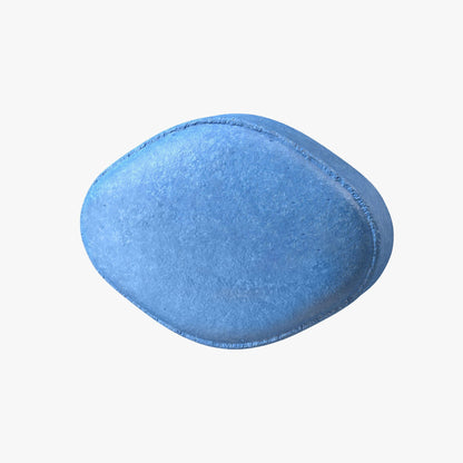 Single unmarked blue Viagra tablet on white background








